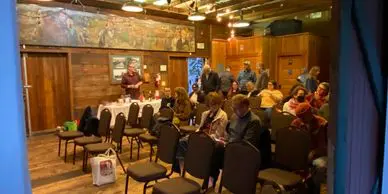 Cozy room with attendees and art
