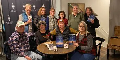 Authors and readers gathering indoors
